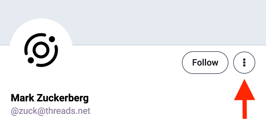 On the left, the Meta Fediverse logo, Mark Zuckerberg, @zuck@threads.net.  On the right, a Follow Button and a button with three dots on it.  A red arrow points to the button with the three dots on it