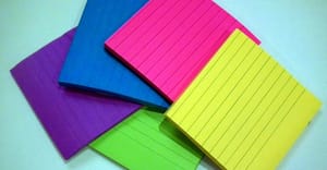 Post-it notes in purple, blue, hot pink, yellow, and lime green.